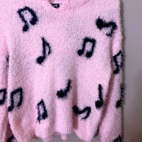 Pink fuzzy sweater with black music notes - Picture 1 of 2